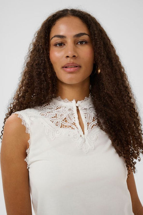Cream 10614886 Sleeveless Blouse With High Neckline